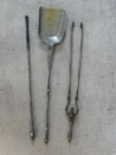 An early 19th century steel fire set; pair of tongs, shovel and poker. L.79cm