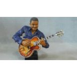 A Willits Design head and bust figure from the All That Jazz series, Jamming, number 975 from a