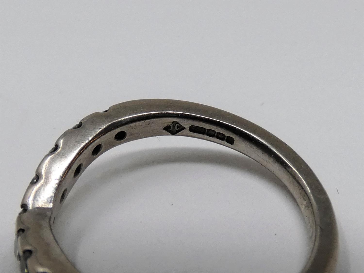 A vintage wishbone 18ct white gold and diamond half eternity ring. Set with nine round brilliant cut - Image 5 of 5