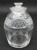 A Georgian cut glass honey jar with polished pontil and linear and diamond cut design with lid.