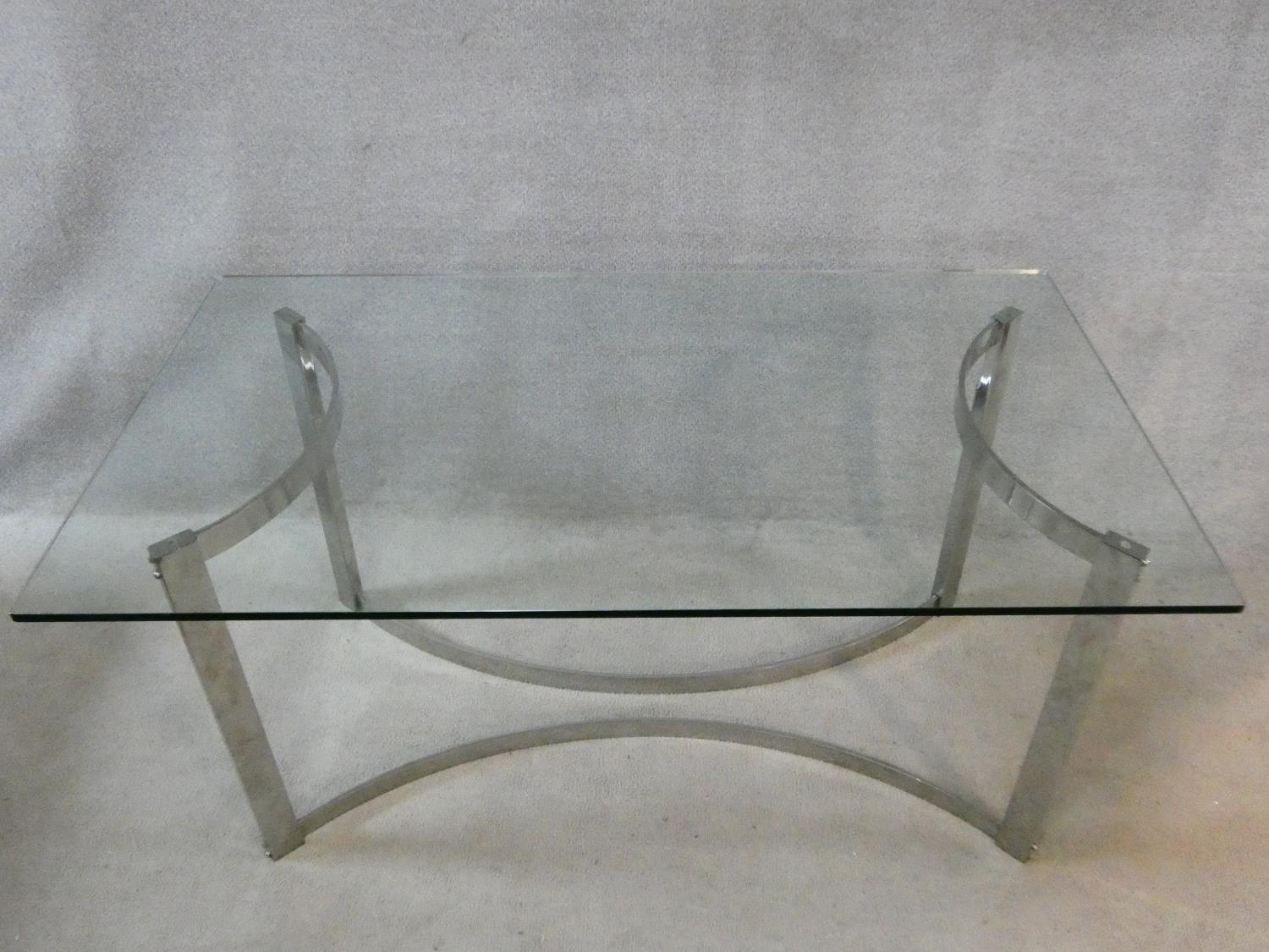 A vintage dining table in the style of Gavina, the heavy plate glass top resting on a shaped - Image 3 of 3