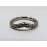 A vintage wishbone 18ct white gold and diamond half eternity ring. Set with nine round brilliant cut