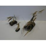 A 20th century Chinese carved horn figure group of prawns underwater in a naturalistic setting on