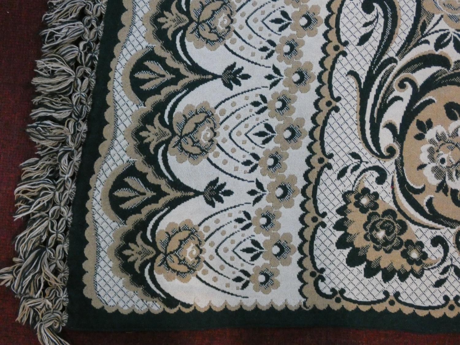 A large heavy woven woolen throw with a central green and yellow medallion and stylised floral - Image 3 of 4