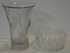 A large crystal vase with frosted leaf design and a cut crystal fruit bowl with star cut base. H.