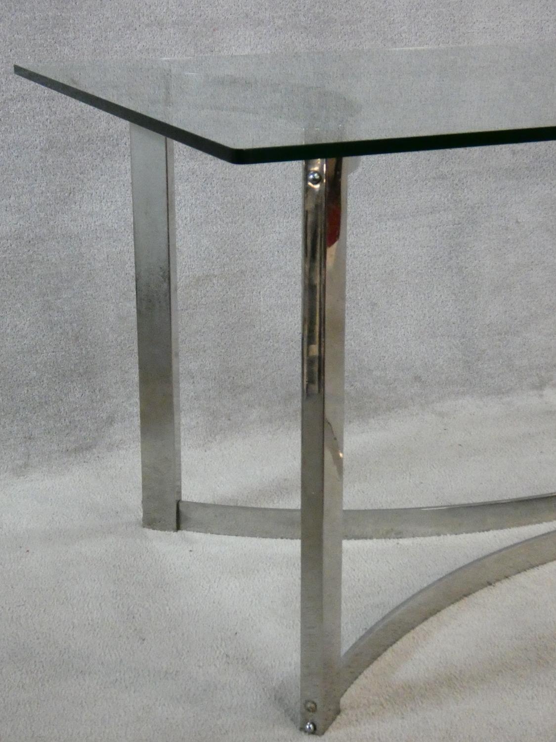 A vintage dining table in the style of Gavina, the heavy plate glass top resting on a shaped - Image 2 of 3