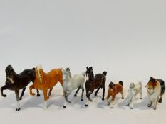 A collection of porcelain animals including four hand painted porcelain Beswick horses, makers stamp