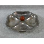 A large Art Deco silver plated quatrefoil shaped sectional serving dish with central bakelite