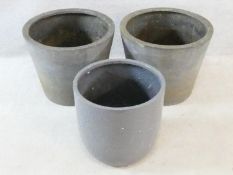 A set of three faux stoneware garden planters. 40x48cm