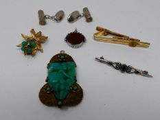 A collection of jewellery. Including an Art Deco jade glass and brass fruit design pendant, a pair