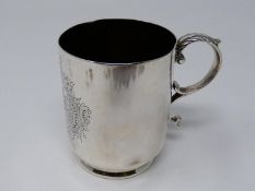 A Victorian Walker & Hall silver tankard with engraved monogram within stylized scrolling foliate