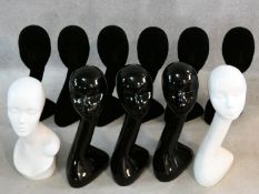 Eleven vintage style acrylic and fabric covered millinery mannequins. H.51cm