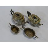 A C.1900 silver plated three piece tea set along with a similar tea pot. H.16xW.29xL.13cm