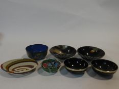 A collection of bowls. Including a Chinese cloisonne enamel bowl, four carved horn and white metal