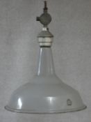 A mid century vintage pendant light shade in grey enamel, British patent mark by Benjamin lights and