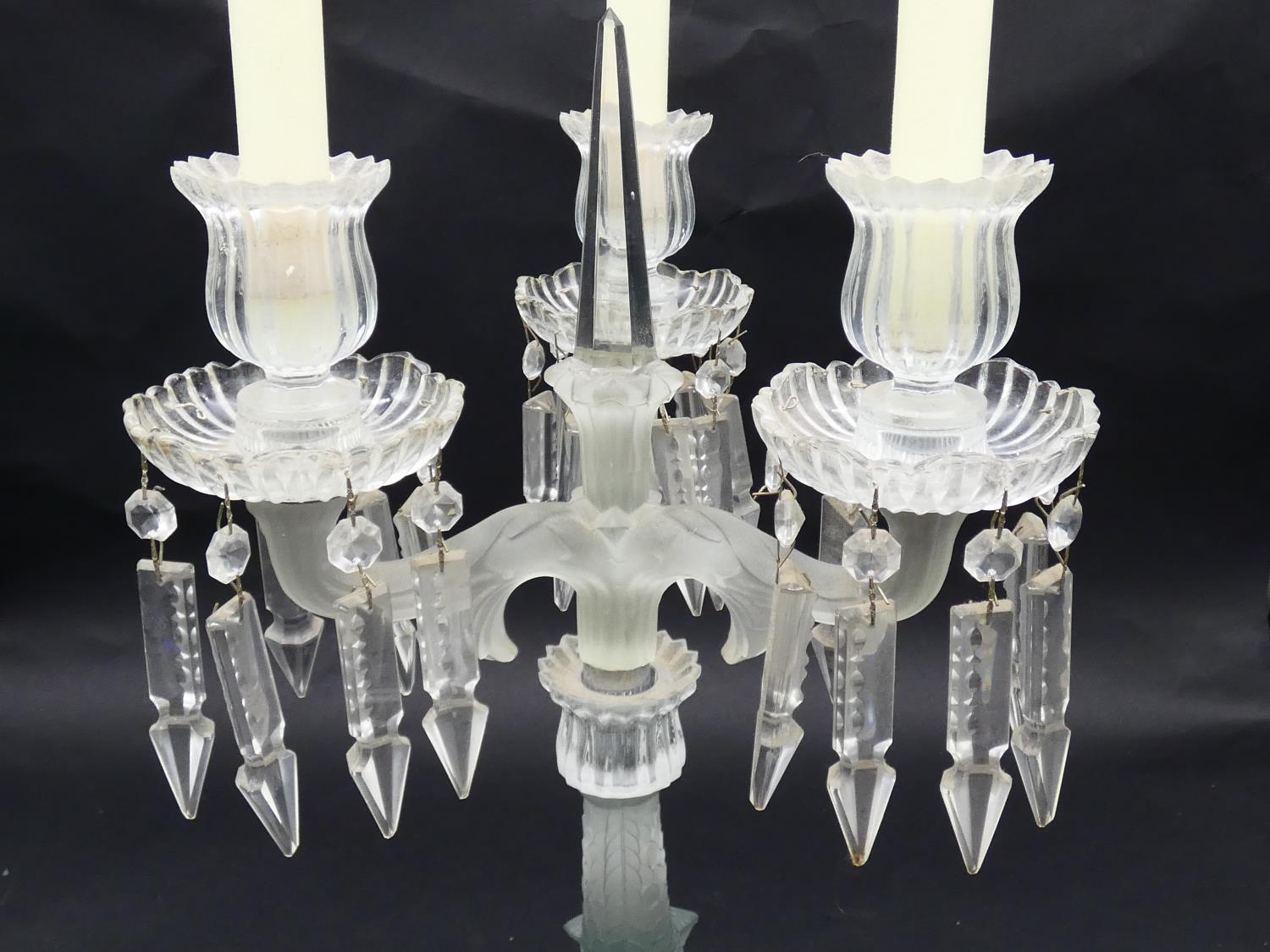 A glass three branch table candelabra with crystal drops on dolphin support. H.50cm - Image 3 of 5