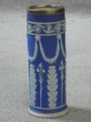 An Victorian Wedgwood blue Jasperware spill vase with acanthus design and silver plated collar.