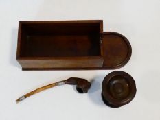 A West African carved pipe with white metal banding, a Georgian carved wood patch stand and a 19th