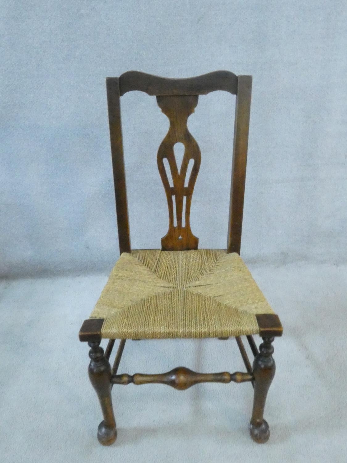 A set of six 19th century country oak dining chairs with pierced splat backs above woven rush - Image 2 of 4