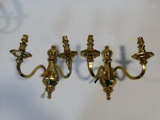 A pair of heavy solid brass Dutch style two branch wall candelabras. H.31cm