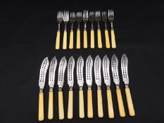 A set of ten 19th century silver plated fish knives and forks with pierced and engraved design and