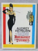 A vintage style advertising print on canvas, Breakfast at Tiffany's starring Audrey Hepburn. 79x60cm