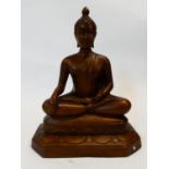 A gilded resin seated Buddha figure. H.41xW.32xL.20cm