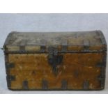A 19th century iron bound domed top travelling trunk in deer skin hide covering. H.38 W.66 D.39cm