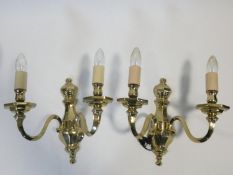 A pair of heavy solid brass Dutch style two branch wall candelabras. H.31cm