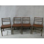 A set of four vintage teak dining chairs. H.78cm