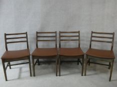 A set of four vintage teak dining chairs. H.78cm