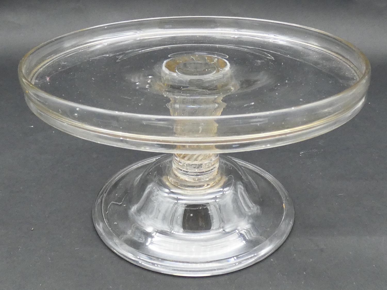A Georgian glass tazza, circular tray-top, spiral-twist and knopped column on bell-shaped foot
