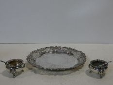 An etched and pierced 19th century silver plated card tray and a pair of Georgian style silver