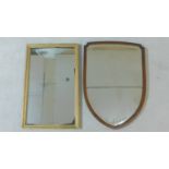 A gilt framed wall mirror and a mahogany framed shield shaped mirror. H.82xW.52cm