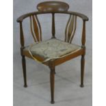 An Edwardian mahogany and satinwood inlaid corner chair. H.75cm