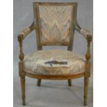 A 19th century Louis XVI style painted pitch pine fauteuil. H.86cm (upholstery and paint worn)
