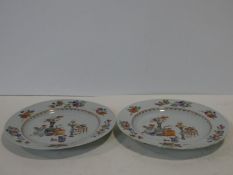 Two 18th century, Qianlong period Chinese painted porcelain plates. With vase and fruit design and