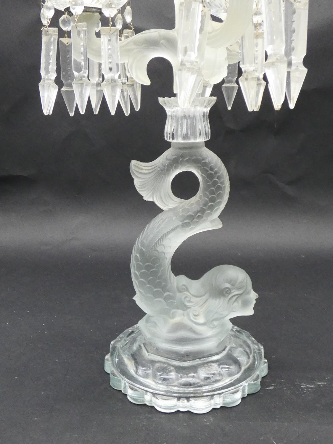 A glass three branch table candelabra with crystal drops on dolphin support. H.50cm - Image 4 of 5