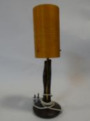 A mid century post modern design wood and brass table lamp. H.50cm