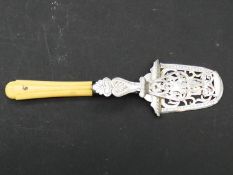 A pair of 19th century silver plated pierced asparagus tongs with initial to the ivory handle. L.