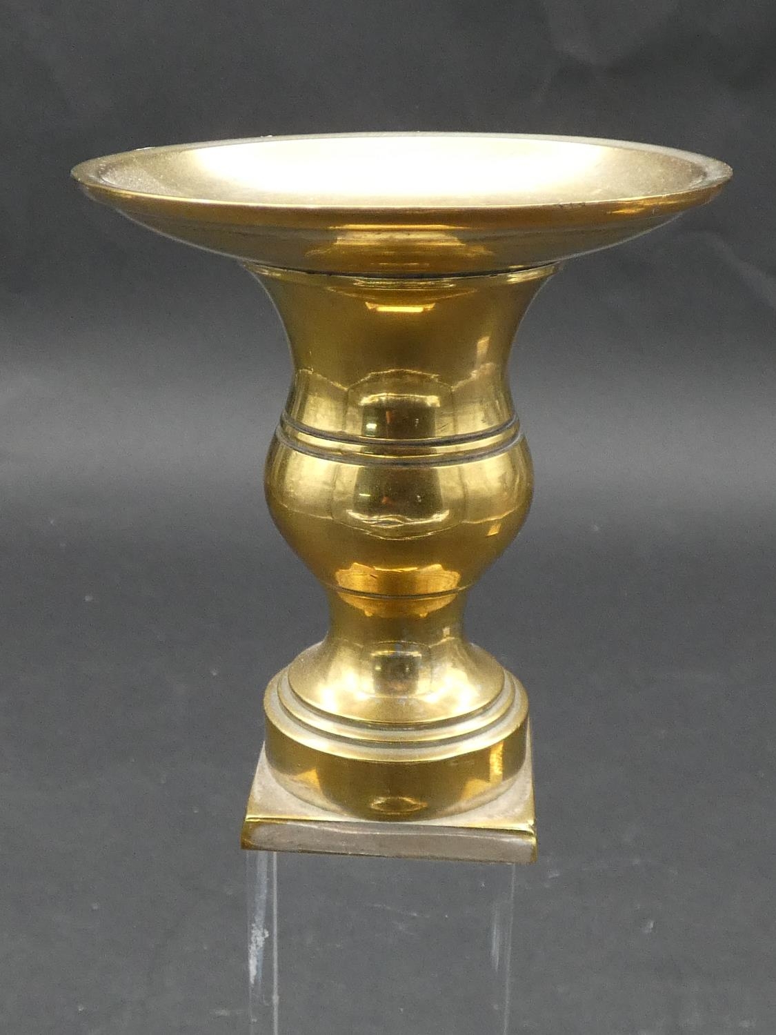 A pair of brass and perspex Empire style candlesticks on platform bases resting on ball feet. H.25cm - Image 6 of 6