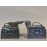 Two Chinese porcelain hand painted portable urinals with floral blue and white design. One