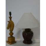 A vintage carved alabaster table lamp in the form of a horses head on stepped base along with a