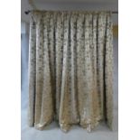 A pair of Chelsea Harbour Design Studio lined curtains in scrolling foliate and exotic bird design