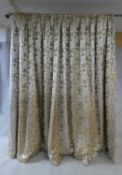 A pair of Chelsea Harbour Design Studio lined curtains in scrolling foliate and exotic bird design