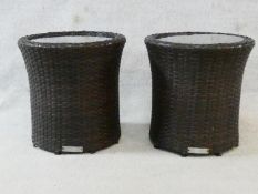 A pair of John Lewis brown rattan conservatory side tables. H.38xD.38cm