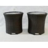 A pair of John Lewis brown rattan conservatory side tables. H.38xD.38cm