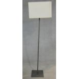 A contemporary metal framed standard lamp. H.141cm