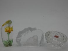 A Mats Jonasson glass flower sculpture, a similar sculpture of a seal cub and a Wychbury cut crystal