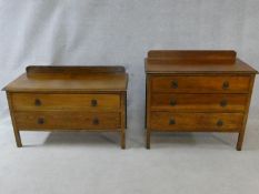 A pair of mid century oak bedroom chests, one with two drawers and the other with three. H.83xW.